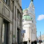 The inconspicuous outside with a little church by its side
